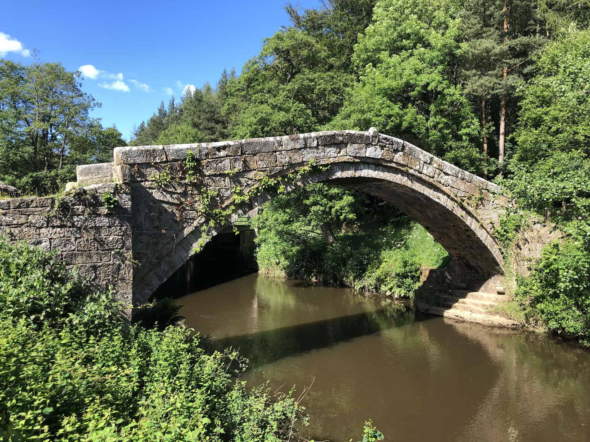 Beggar's Bridge is a survivor from a time when horse-power and walking were the main modes of transport. It is a 'packhorse' bridge, designed with a low parapet to allow horses with fully laden panniers to cross without touching the sides.