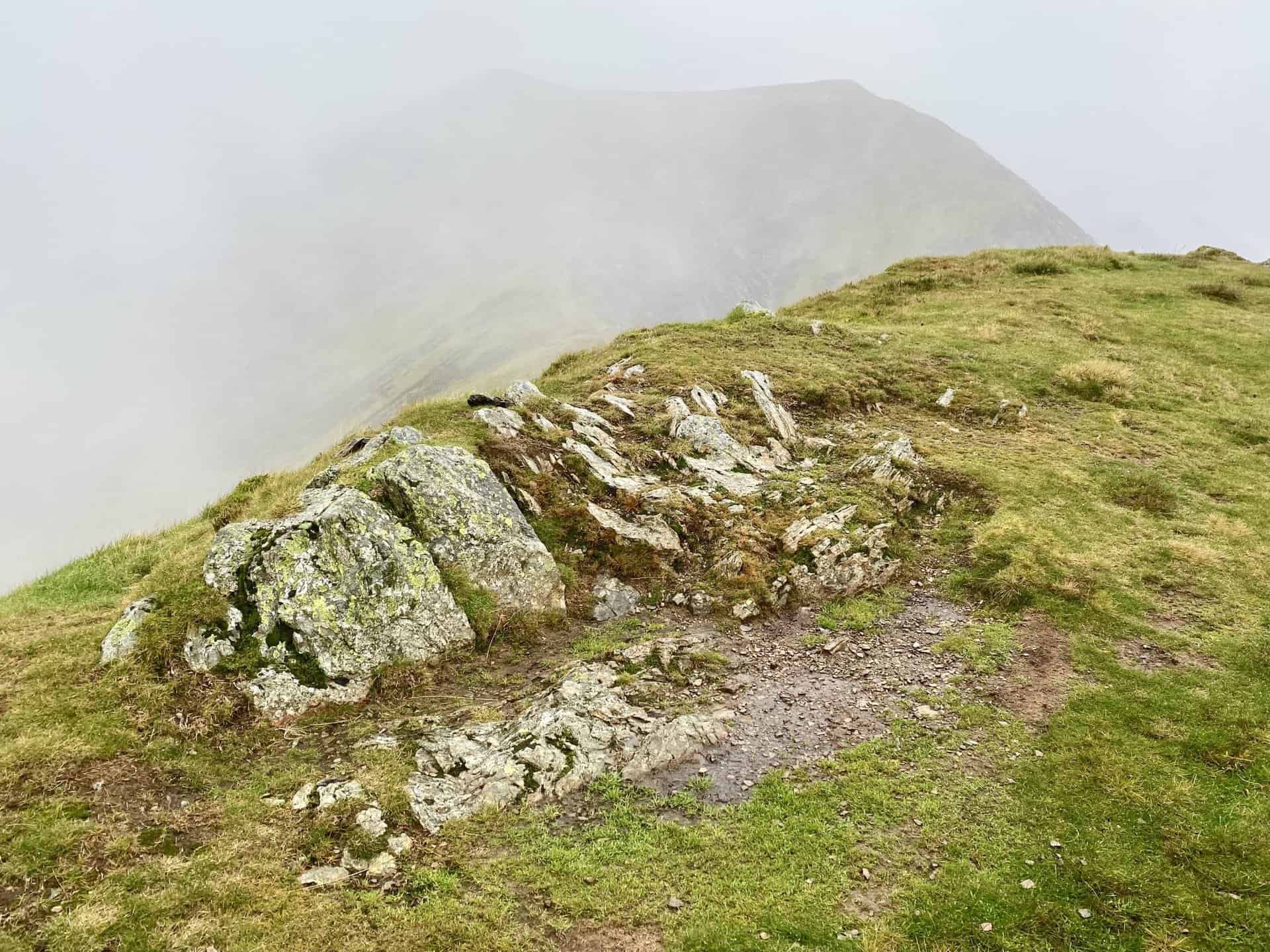 The summit of Whiteless Pike, height 660 metres (2165 feet). The Coledale Horseshoe can be completed without visiting Whiteless Pike.