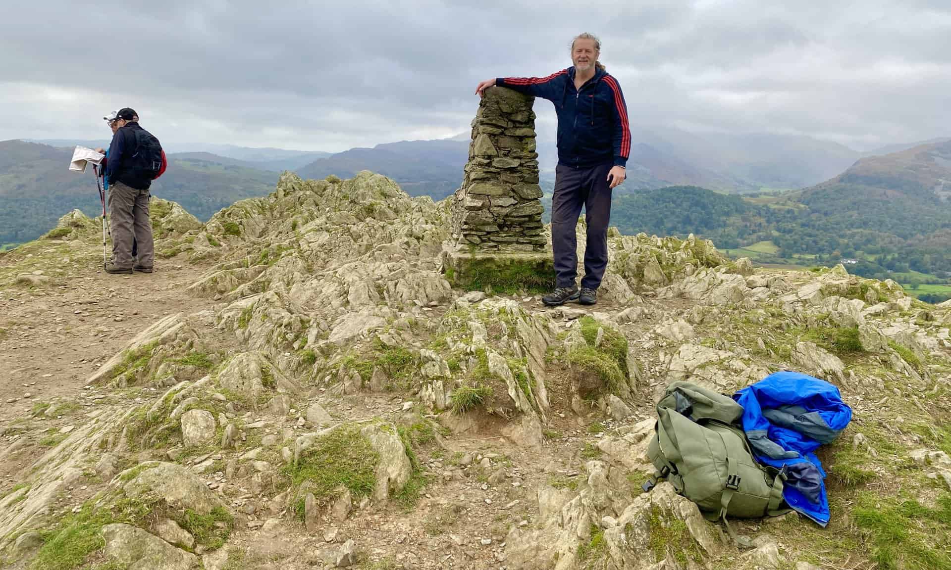 Kevin and I at the triangulation pillar on Loughrigg Fell summit, height 335 metres (1099 feet).