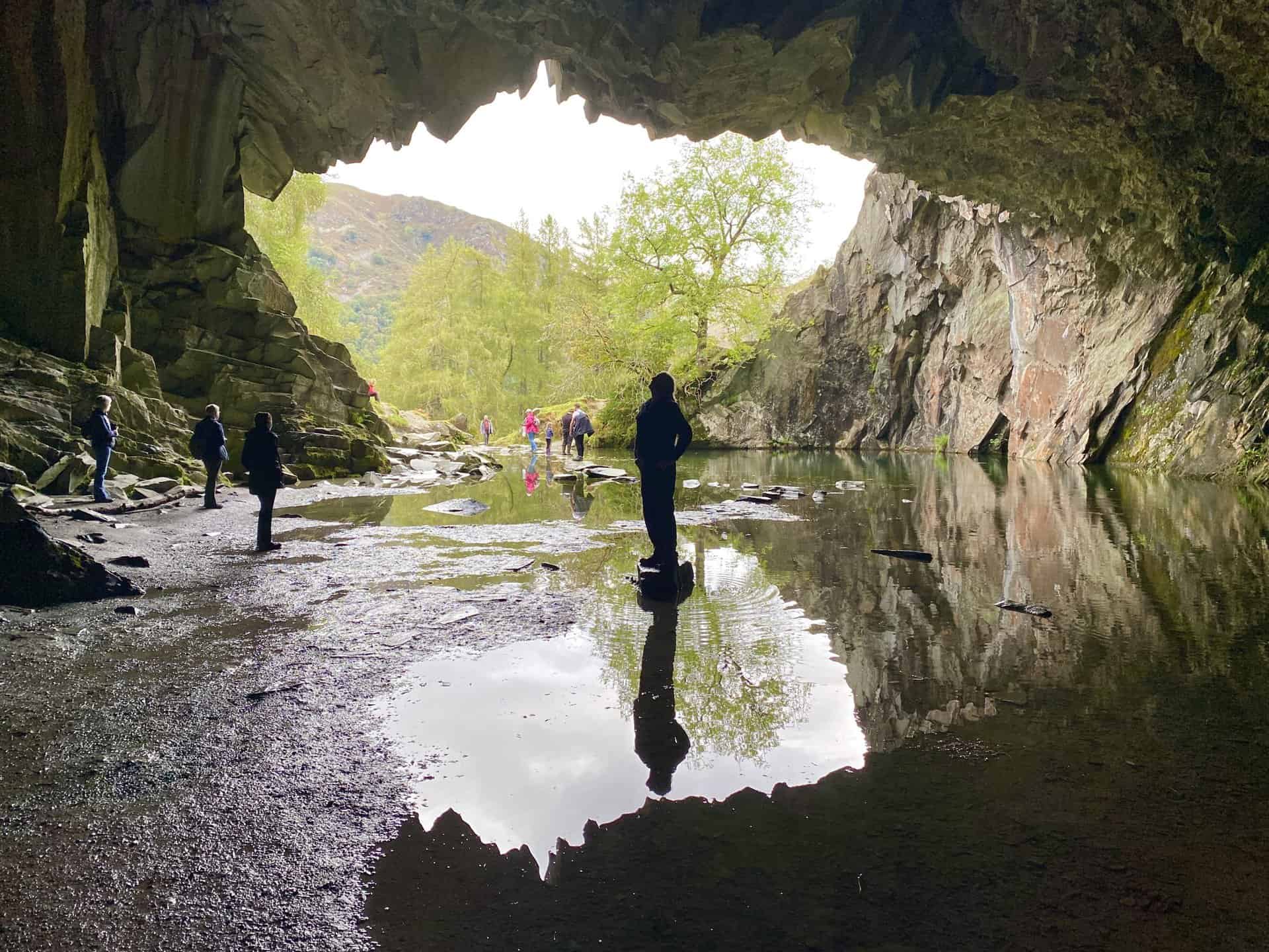 Rydal Cave. A man-made cave on the site of a former slate quarry, with stepping stones leading to a partially dry interior. Visited during our Loughrigg Fell walk in the Lake District.