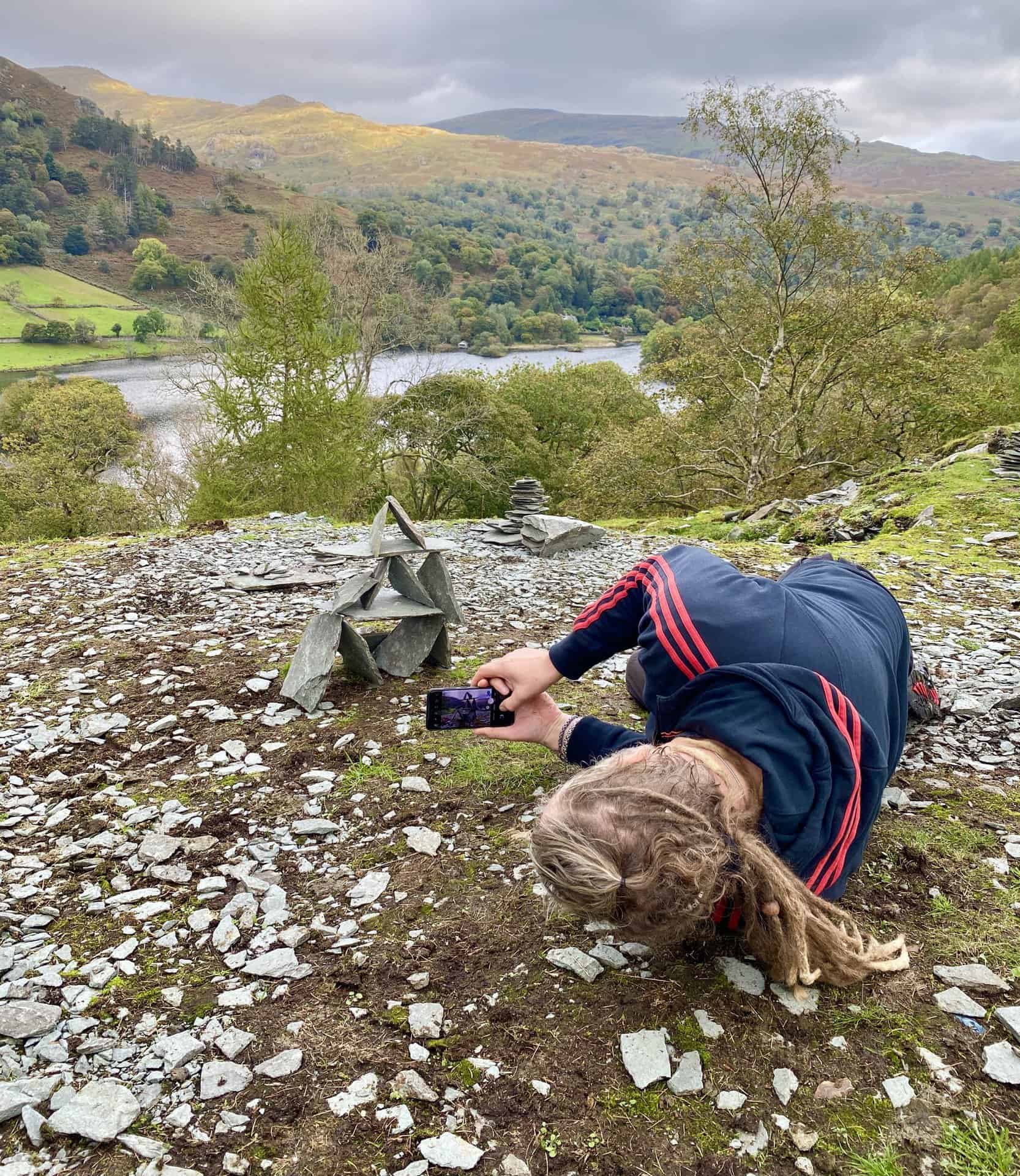 Two of several small slate statues built near the Rydal Cave entrance. Kevin gets a picture from an unusual angle.