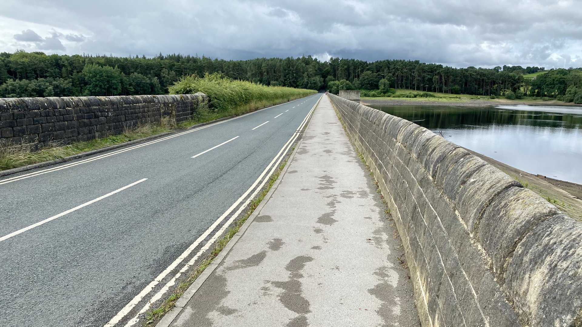 The pedestrian and vehicular path crossing Fewston Embankment.