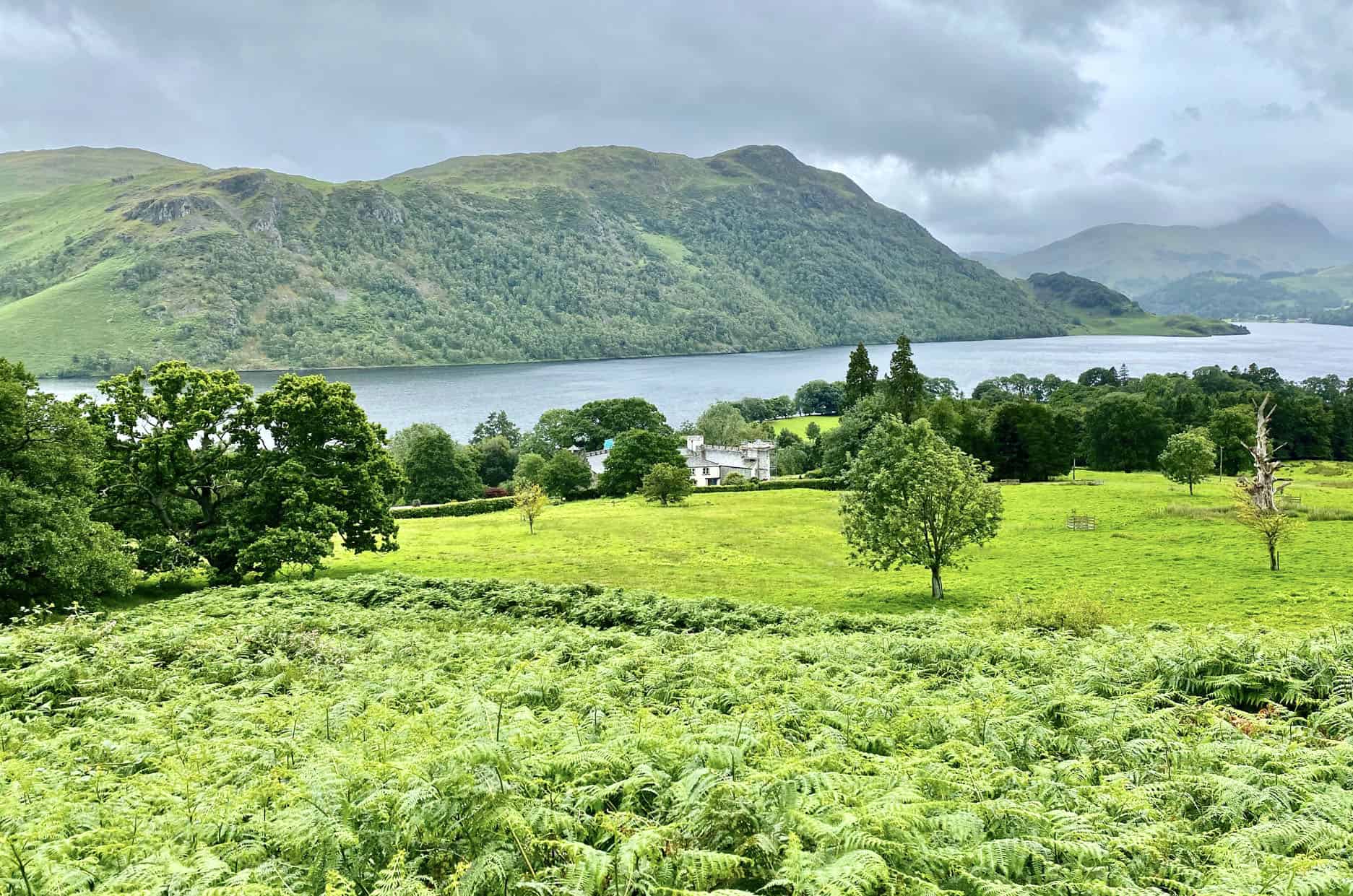 Ullswater backed by Low Birk Fell and Birk Fell. The views during this Gowbarrow Fell walk are stunning.