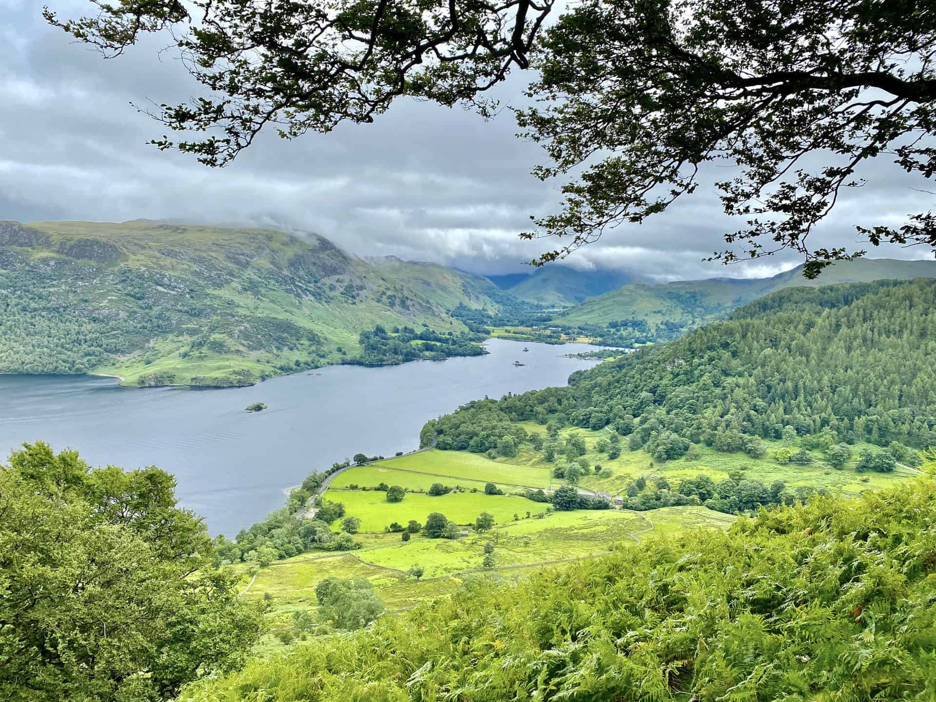 Looking down into the Glencoyne valley from the steep slopes of Glencoyne Brow. In the distance Ullswater reaches its southernmost extent at Patterdale.