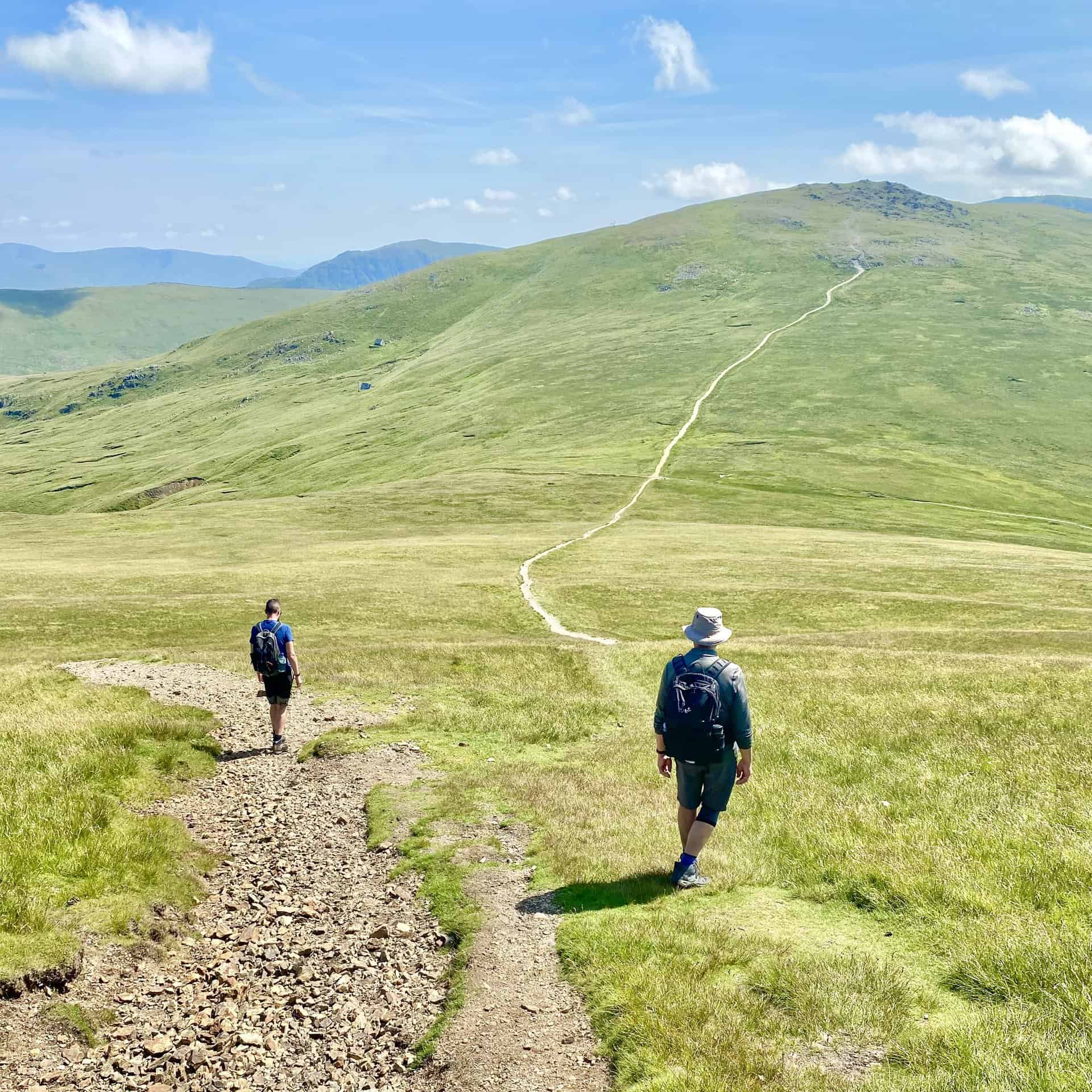 Get ready for a tall tale, folks! In the heart of the English Lake District, where emerald hills meet azure skies, there exists a legendary trio, known as 'The Three Dodds'. They are Great Dodd, Watson’s Dodd and Stybarrow Dodd.
