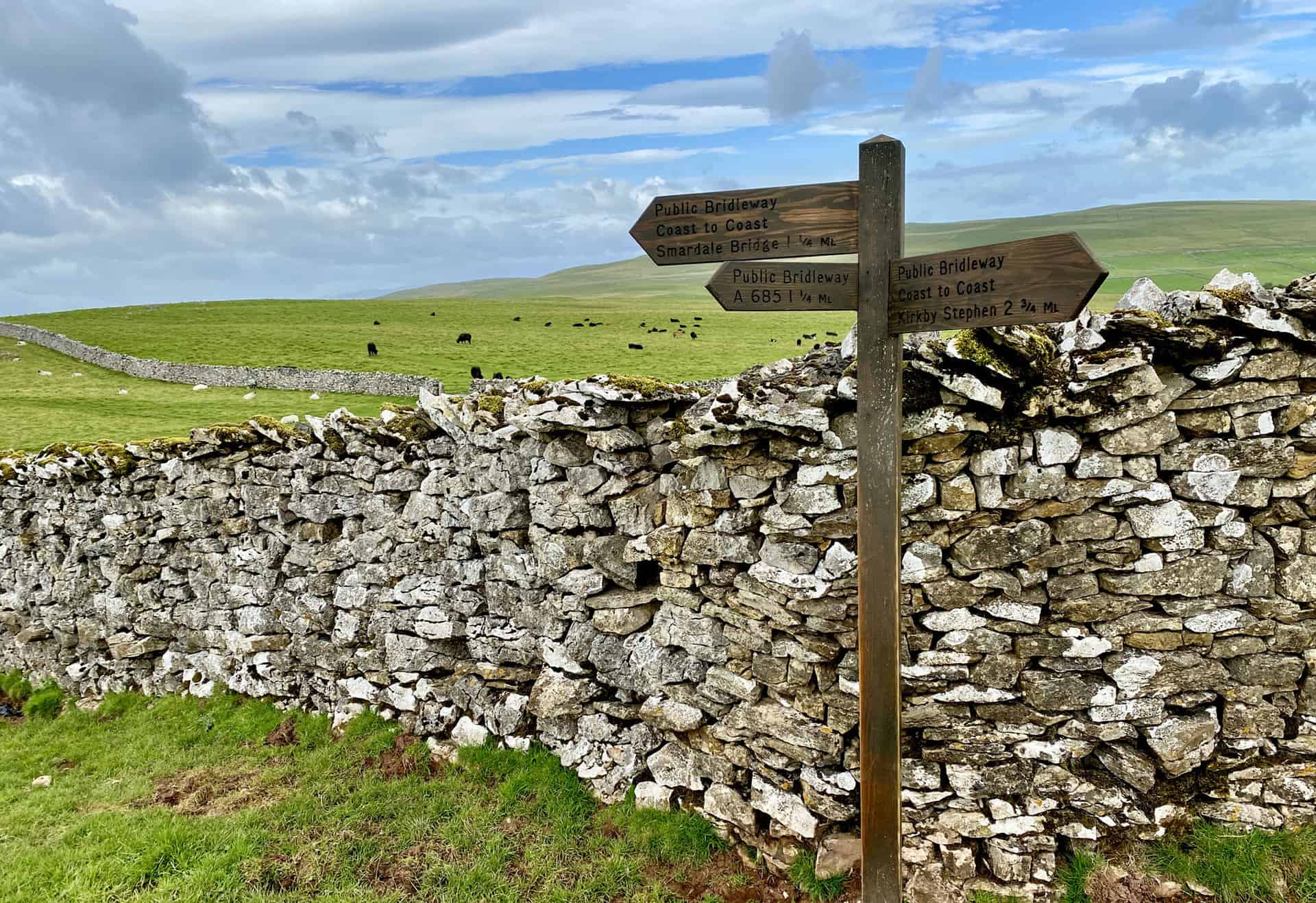 Signpost marking the Coast to Coast walk on Smardale Fell.