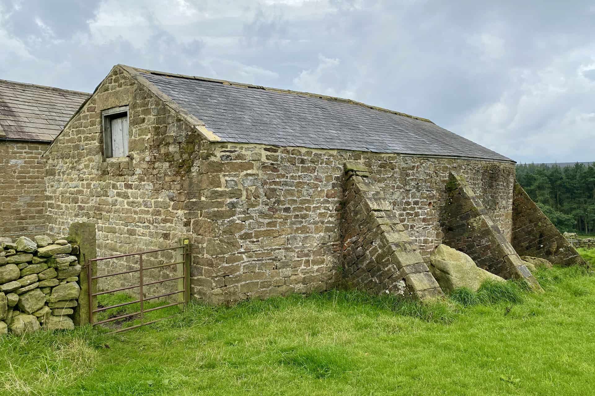Buttressed barn at Bents House.