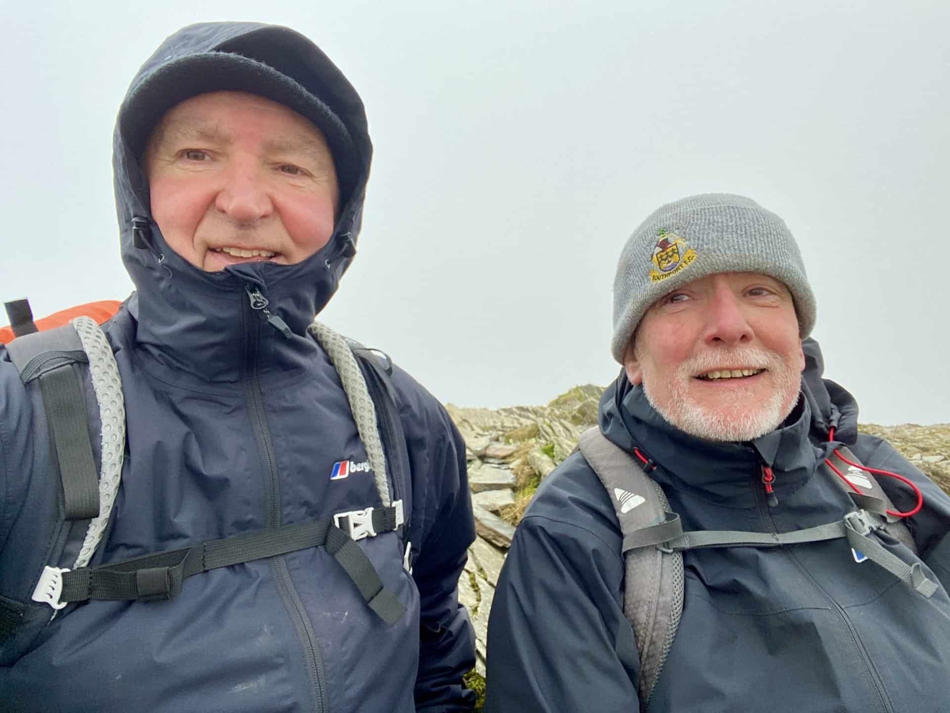 Mike and I on the summit of Grisedale Pike, height 791 metres (2593 feet). We're only about a quarter of the way round our Grisedale Pike walk and it's extremely windy.