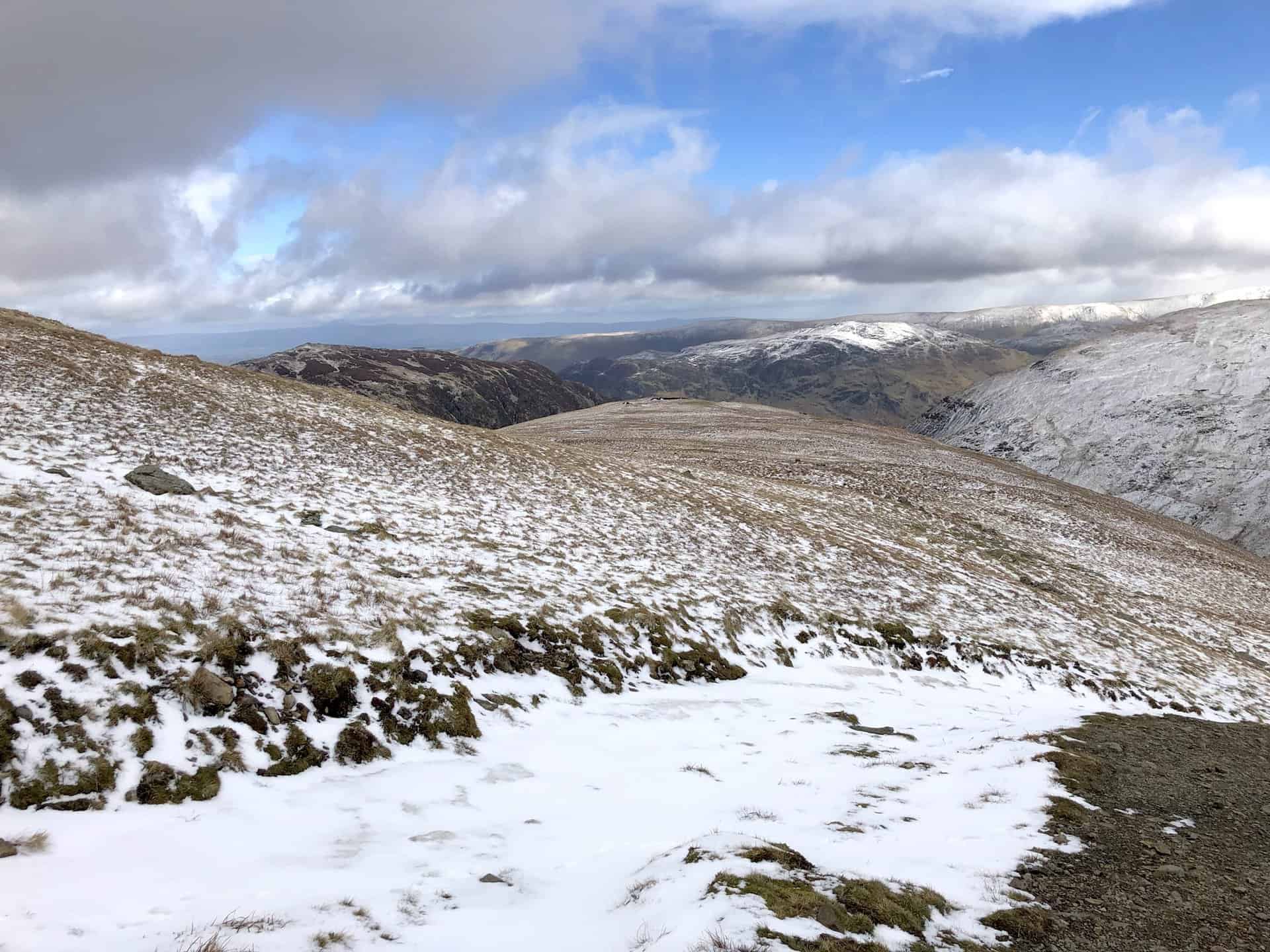 Looking east, Glenridding Common offers a tranquil scene on the Helvellyn walk from Glenridding.