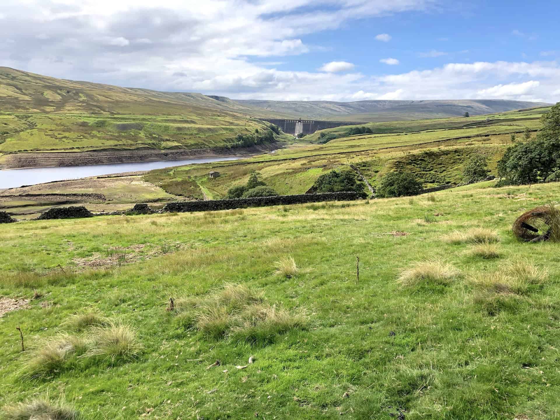 The view south-west towards the dam of Angram Reservoir.