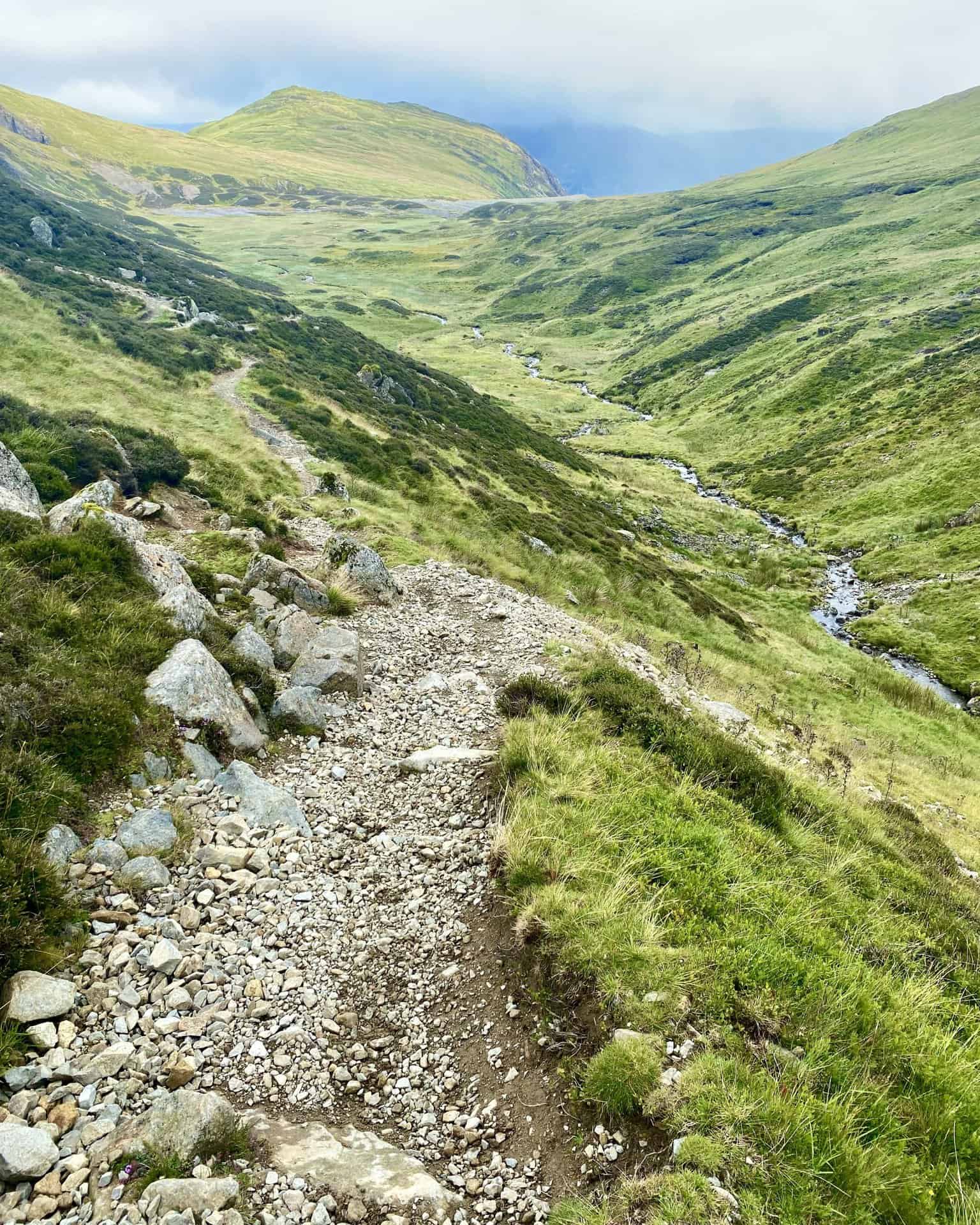 Sticks Gill flowing through the valley, with Sheffield Pike in the background.