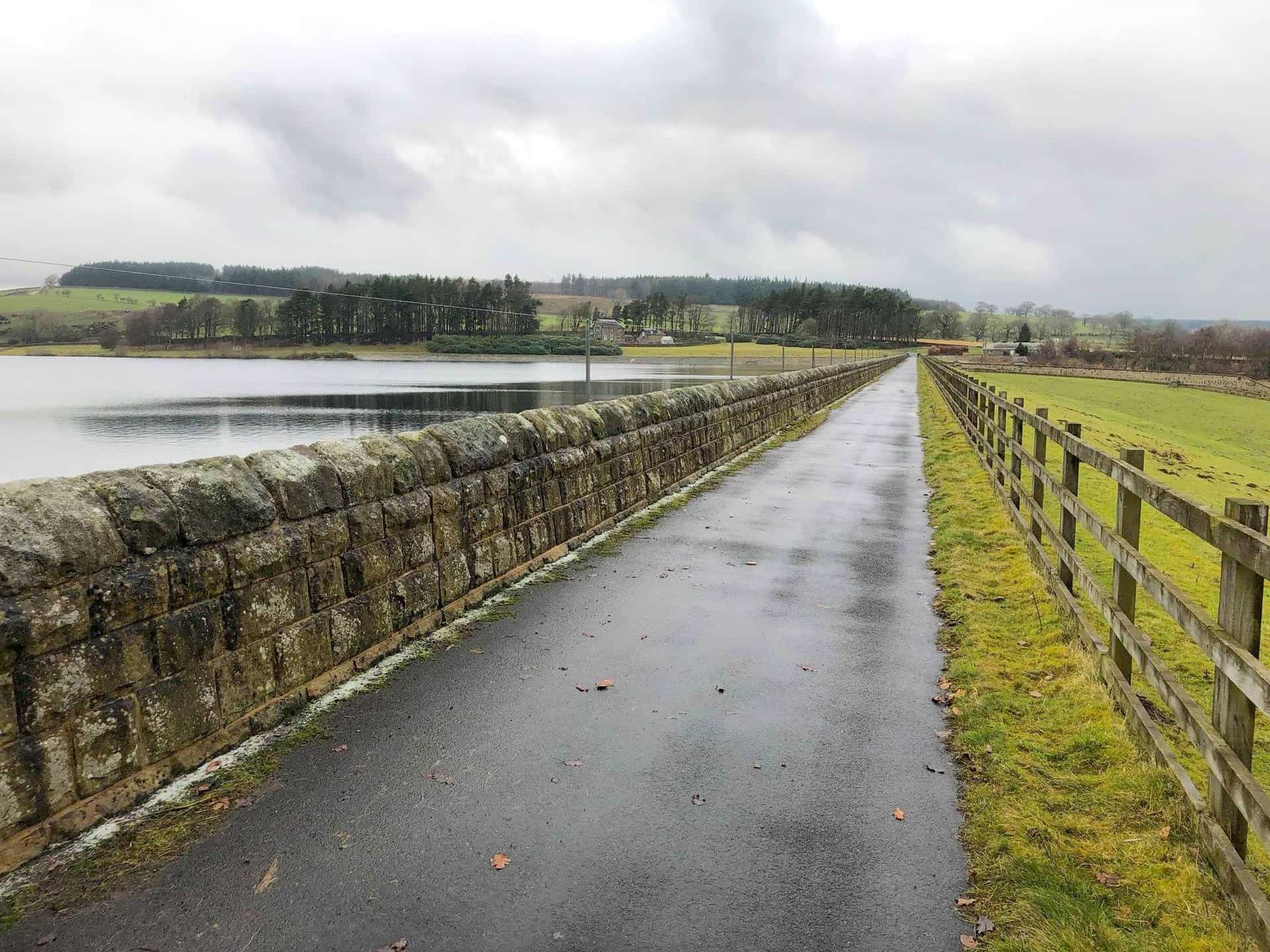 The path across Leighton Reservoir dam.