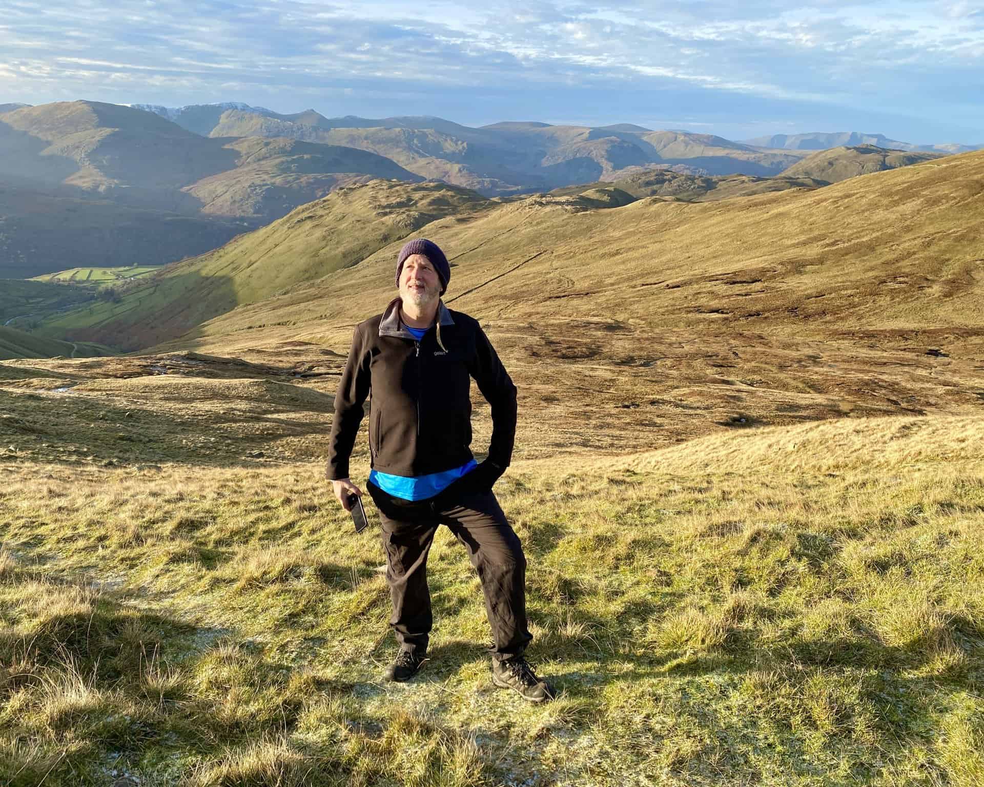 Kev strikes a pose on The Knott, height 739 metres (2425 feet). We are now three-quarters of the way round our Stony Cove Pike walk.