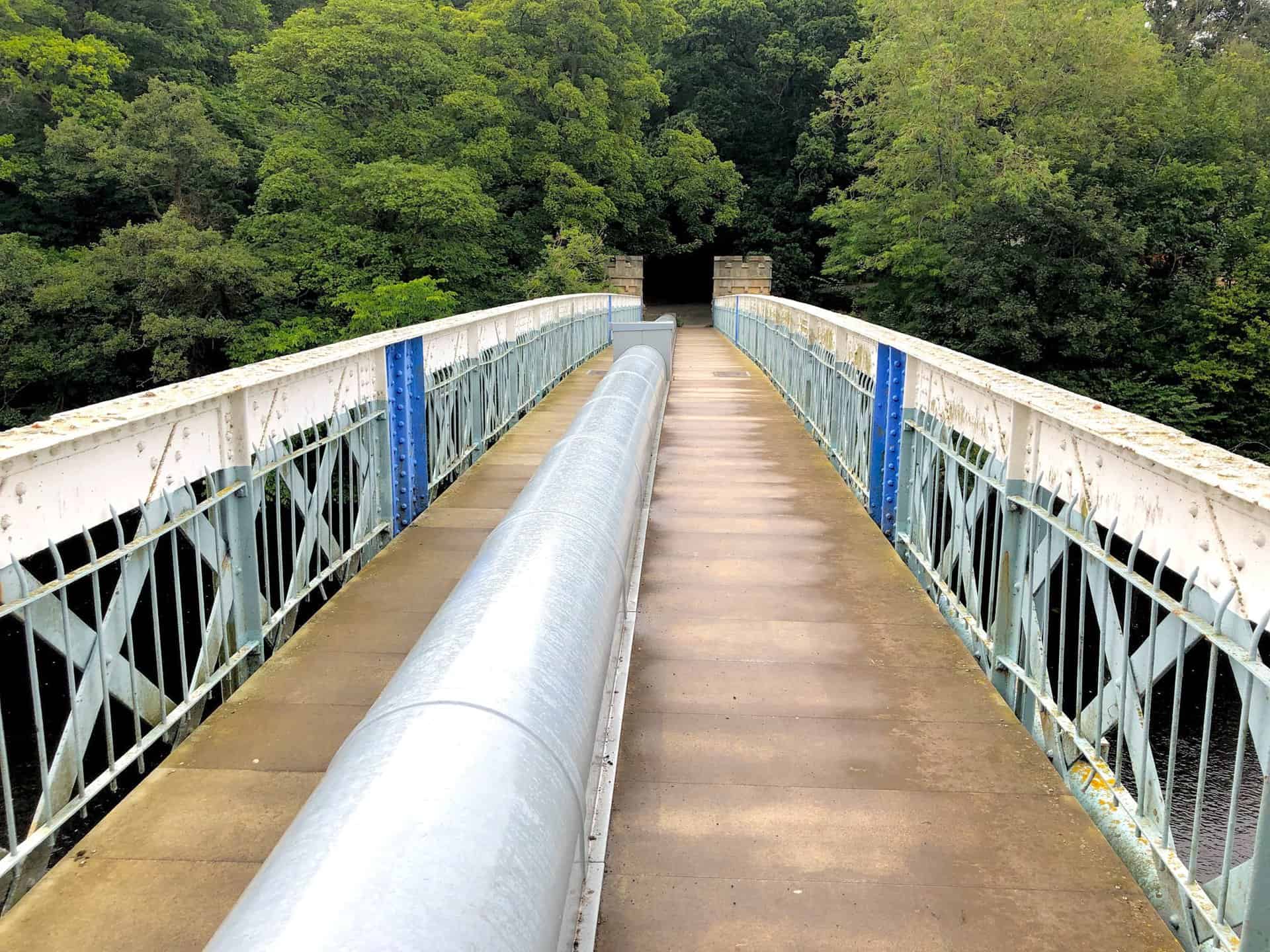 The Grade II listed Deepdale Aqueduct in Barnard Castle, constructed in the 1890s, is a Victorian cast-iron structure with a footbridge designed to transport water from the County Durham hills to Middlesbrough and Stockton-on-Tees. It's a notable feature of this Barnard Castle walk.