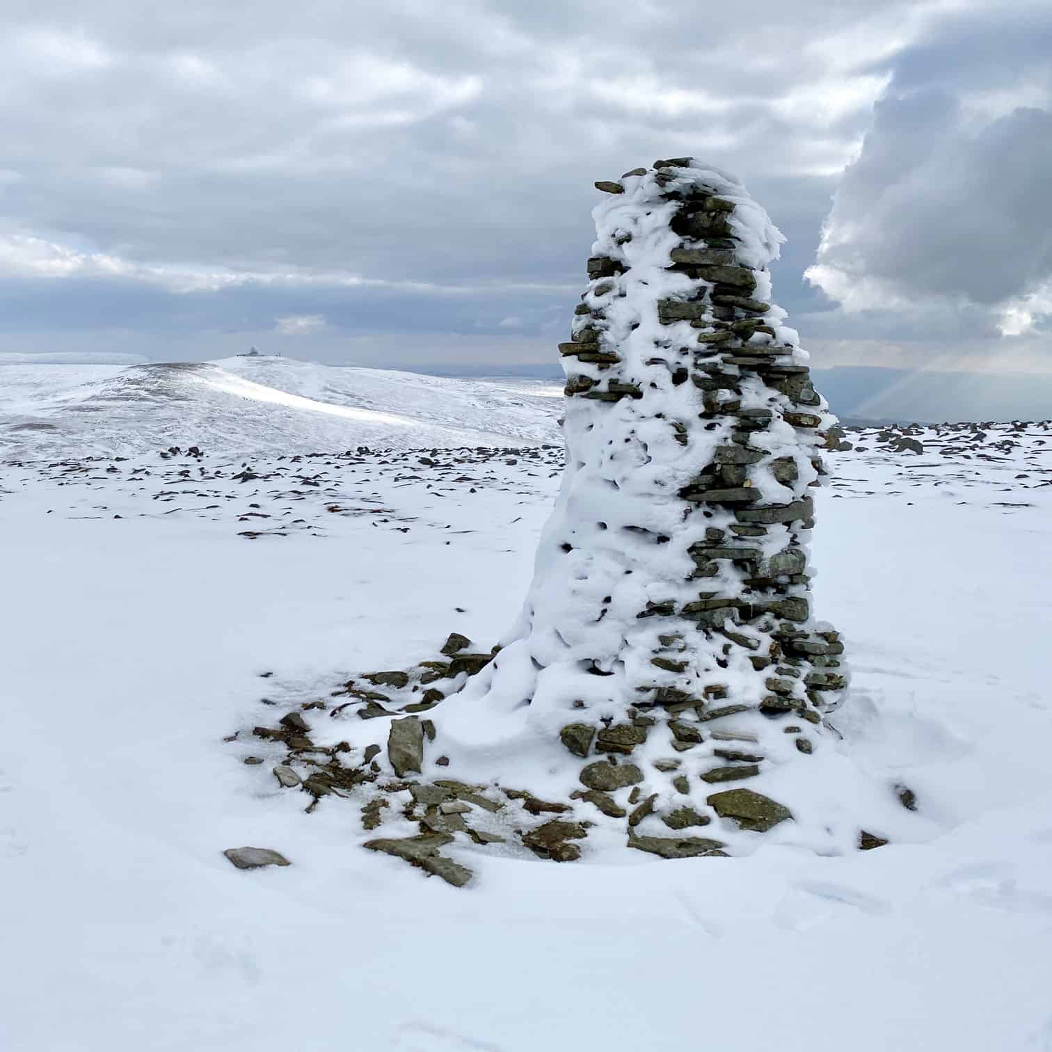 The first of two large cairns on the south-east approach to the Cross Fell summit. It can be seen from a distance and helpfully marks the route of the Pennine Way.