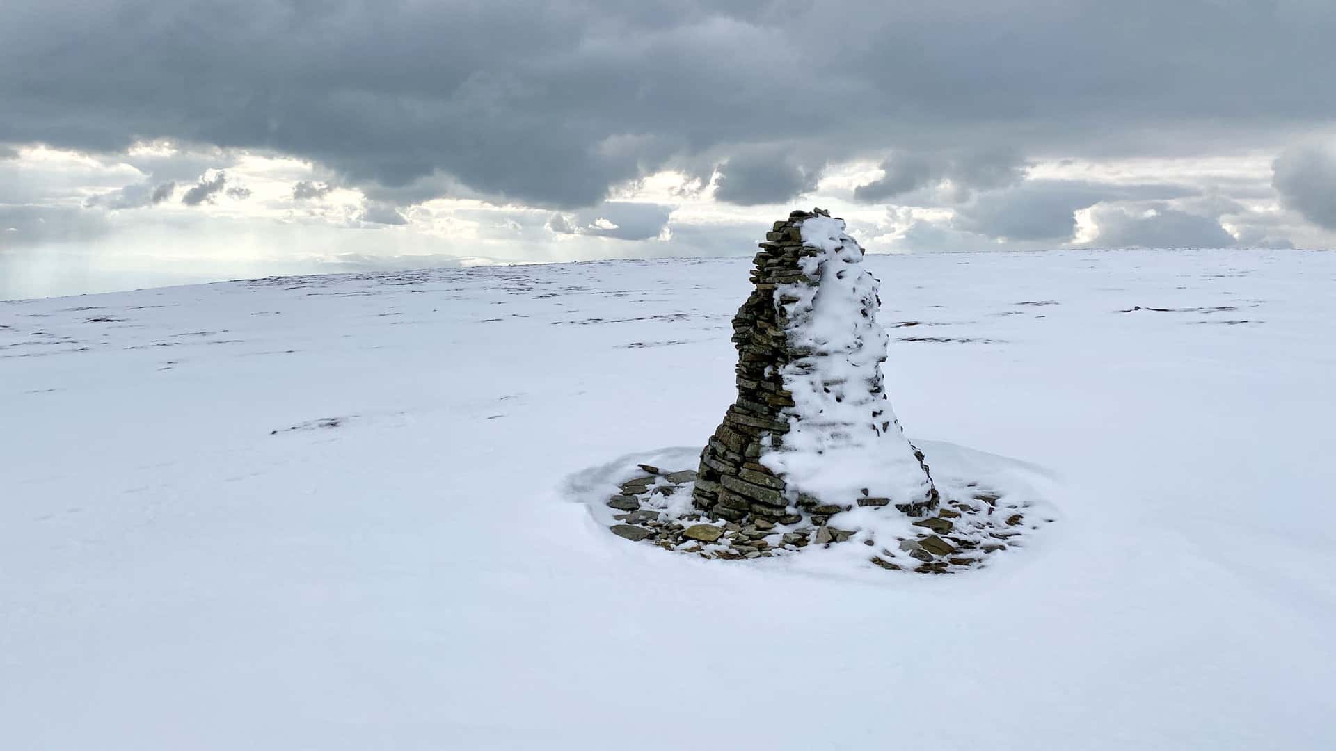 The second of two large cairns on the south-east approach to the Cross Fell summit.