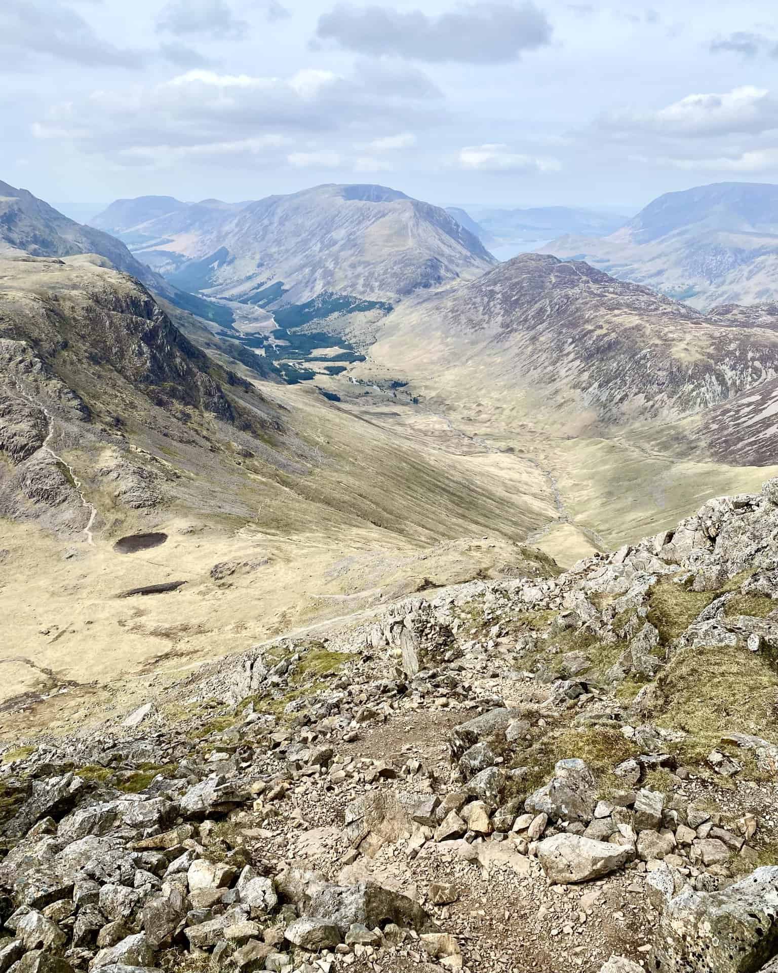 Amazing views during the north-west descent of Great Gable, but care is needed as the steep mountainside is covered with loose, slippery scree. This is roughly the halfway point of the Great Gable walk.