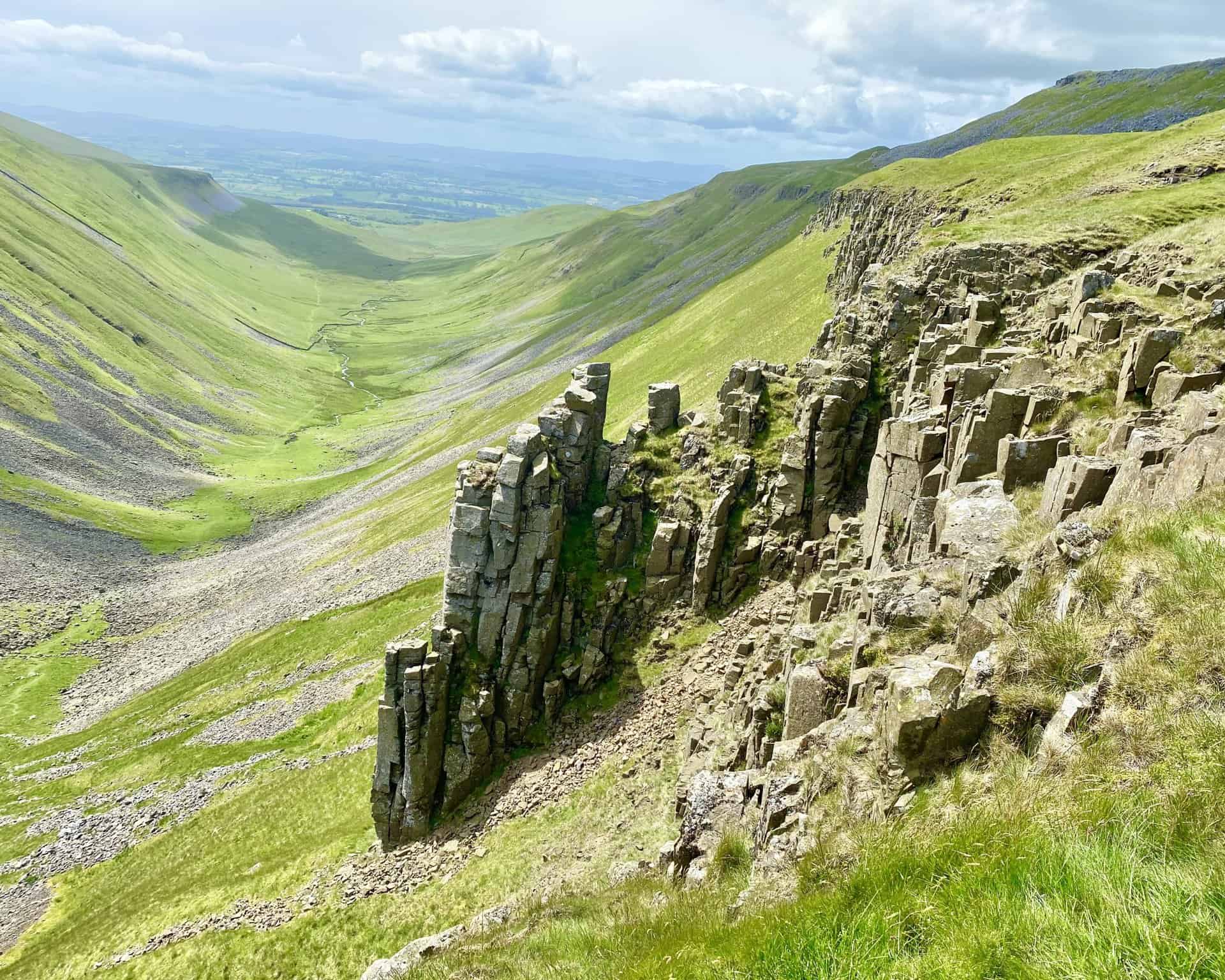 The northern side of the valley near the head is known as Nichol Chair after a local cobbler who, for a bet, practised his craft perched on the rocks.