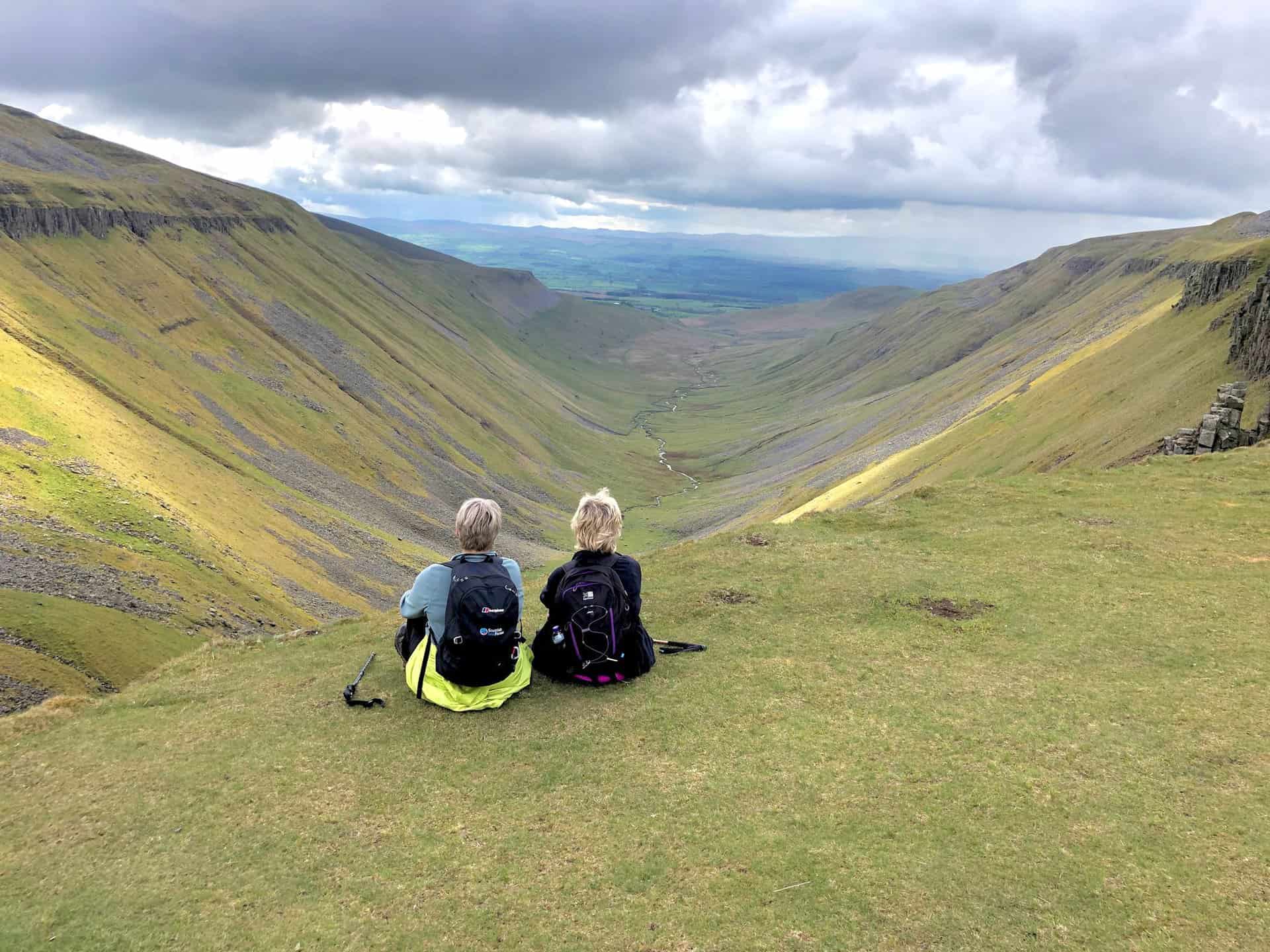 Taking a moment to sit and immerse ourselves in the incredible views and serene atmosphere. Such peaceful moments are what make the High Cup Nick walk truly unforgettable.