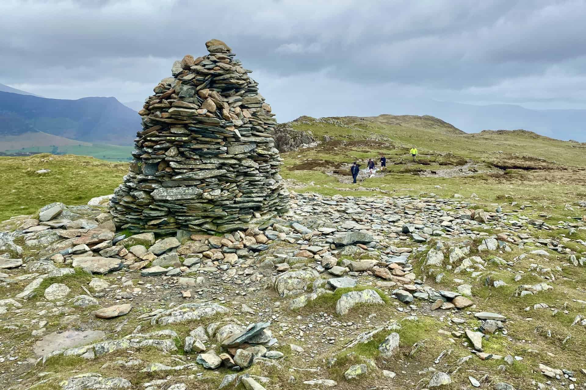 The summit cairn of High Spy, height 653 metres (2142 feet). High Spy is approximately two-thirds of the way round this Newlands Horseshoe walk.