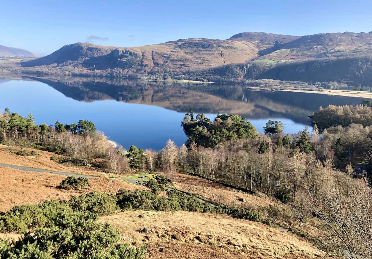 The view north-east across the southern extent of Derwent Water from the eastern flanks of Cat Bells. Bleaberry Fell is the highest point in the background, with Walla Crag on the far left. This picturesque view forms part of the Derwent Water circular walk.