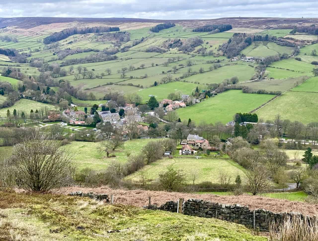 View descending to Rosedale Abbey village from Bank Top, capturing the essence of the Rosedale Abbey railway walk.
