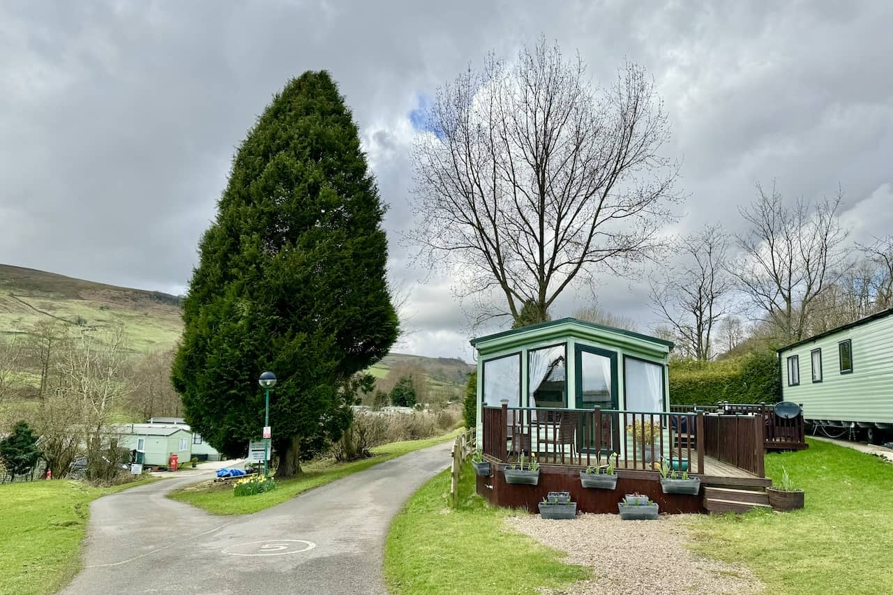 Rosedale Abbey Caravan Park, a family-run retreat offering diverse accommodations against a pastoral backdrop.
