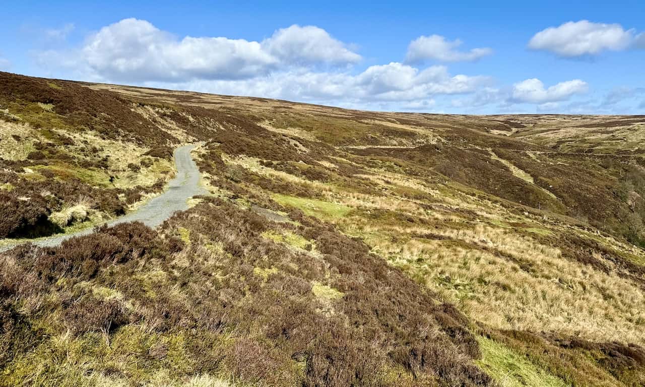 The trackbed skirts around the northern tip of the valley before making a U-turn back along the eastern side. Both the landowners and the National Park Authority maintain the trackbed, ensuring access for estate management and the public.