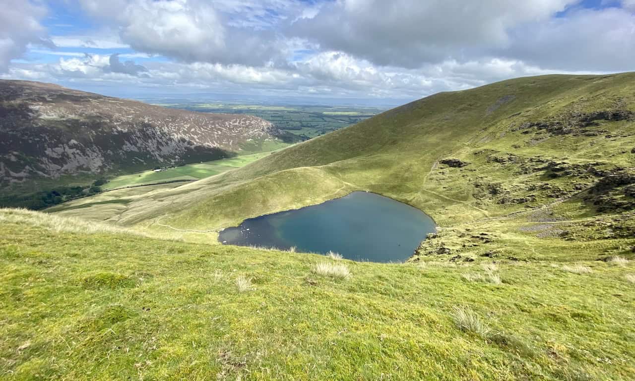Bowscale Tarn in a classic glacial corrie, held in place by a humped moraine.