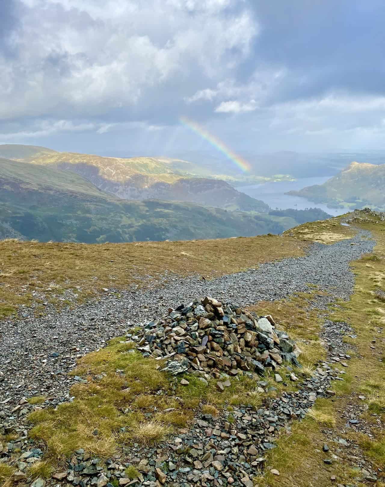 A rainbow appears as we approach the top of St Sunday Crag.