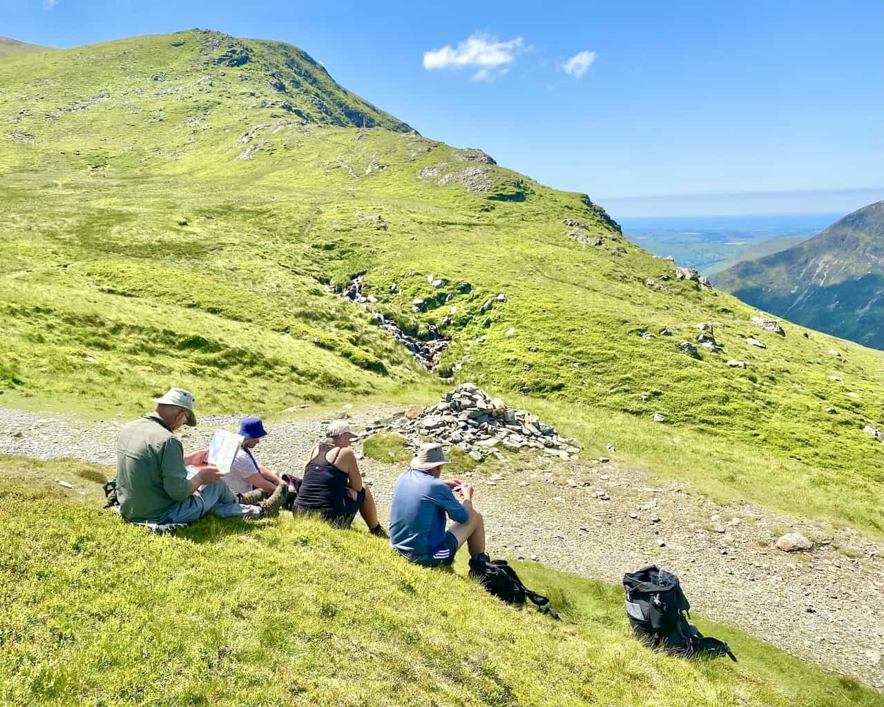 Time for a break at Coledale Hause. Coledale Hause is just over one-third of the way round our Grasmoor walk.