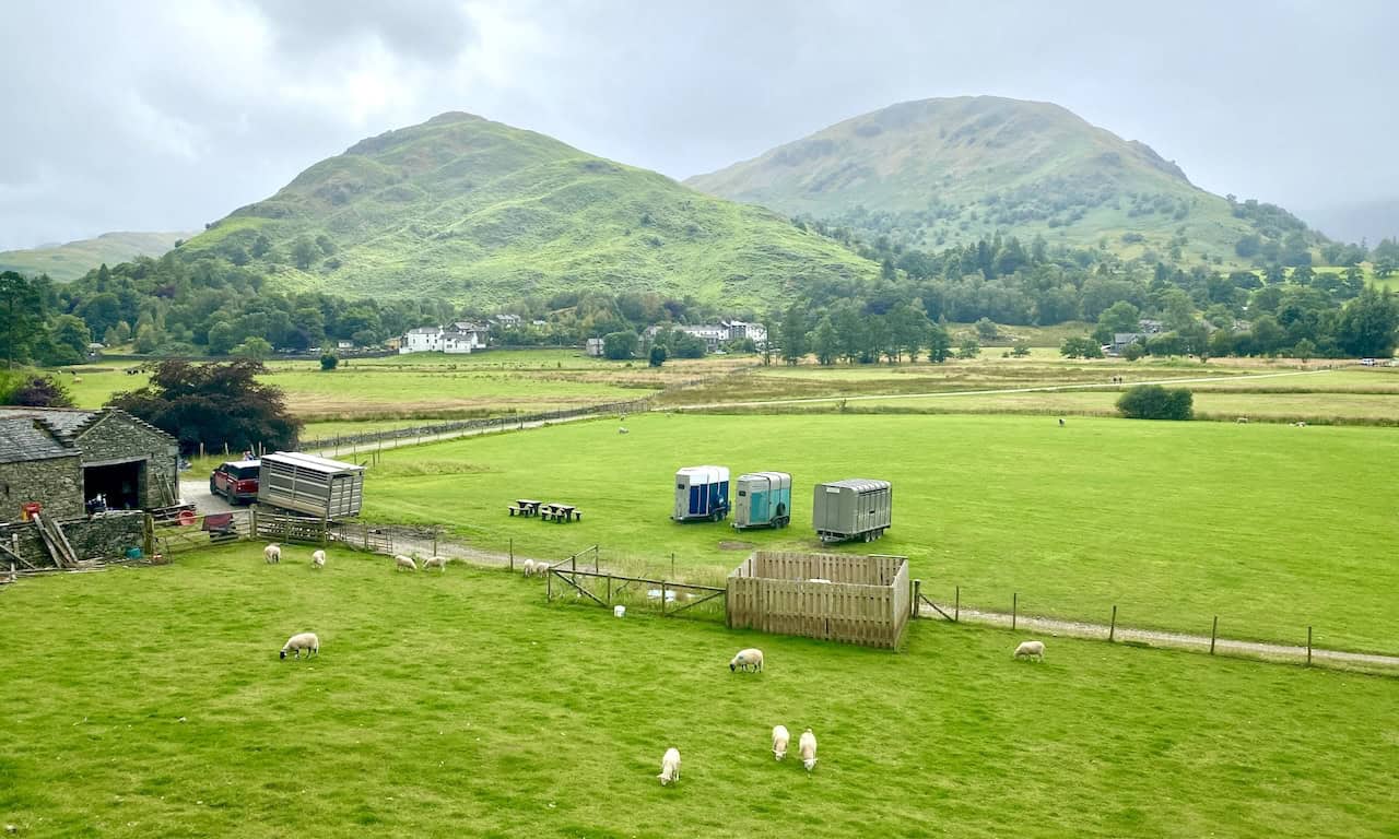 Farmland and the village of Patterdale backed by Arnison Crag (left) and Birks (right). The end of our amazing Place Fell walk is in sight.
