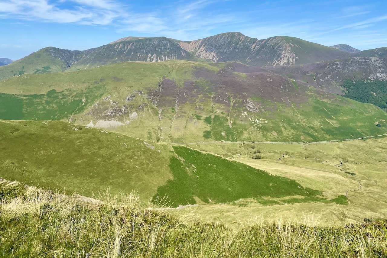 The view north-west towards Knott Rigg and some of the Lake District's north-western fells, such as Whiteless Pike, Wandope and Crag Hill.