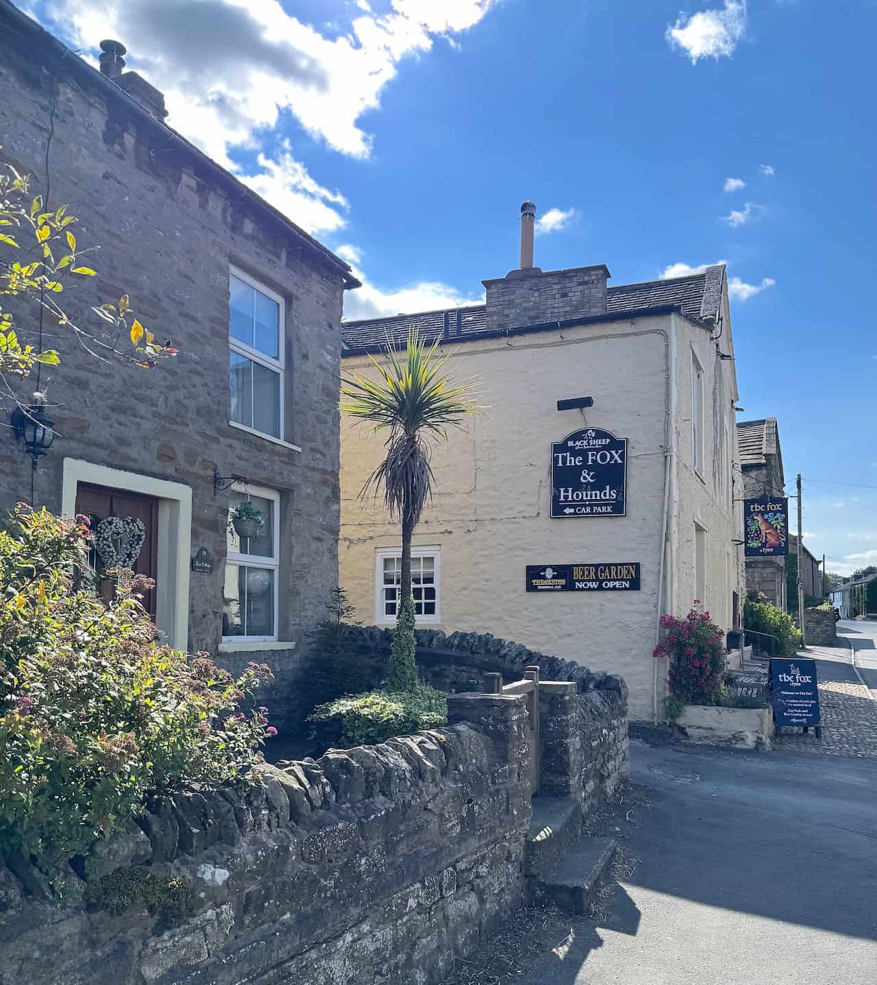 The main street through West Witton features stone cottages and a traditional inn. This is about three-quarters of the way round the Tupgill Park walk.

