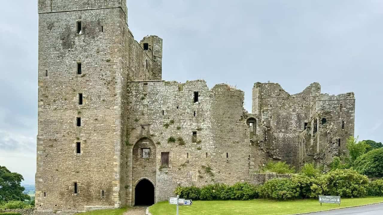 Woodland paths and views towards Castle Bolton on the Aysgarth walk through Wensleydale.