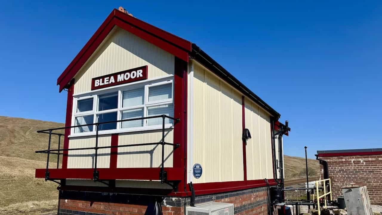 Open moorland ascent and summit views on the Whernside walk from Ribblehead.