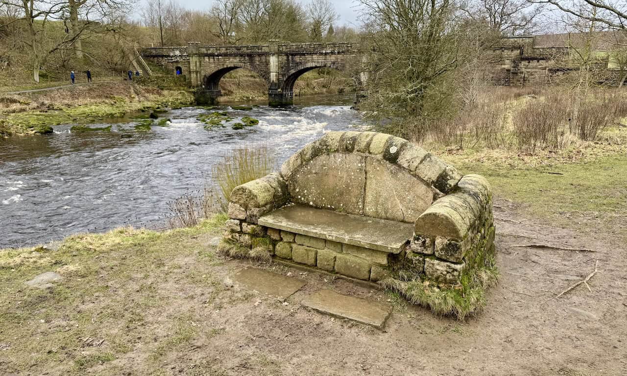 Ornate stone bench near Barden Aqueduct on the Barden Bridge walk.