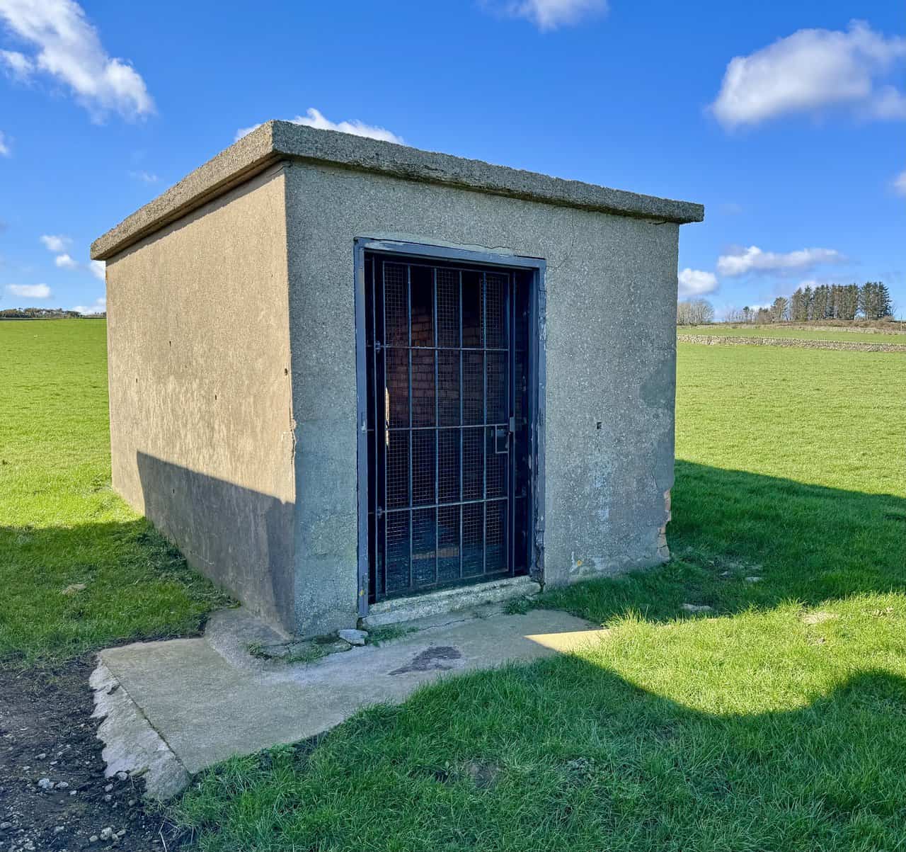 Fuel Store at Ravenscar radar station, a small brick building with a flat concrete roof.