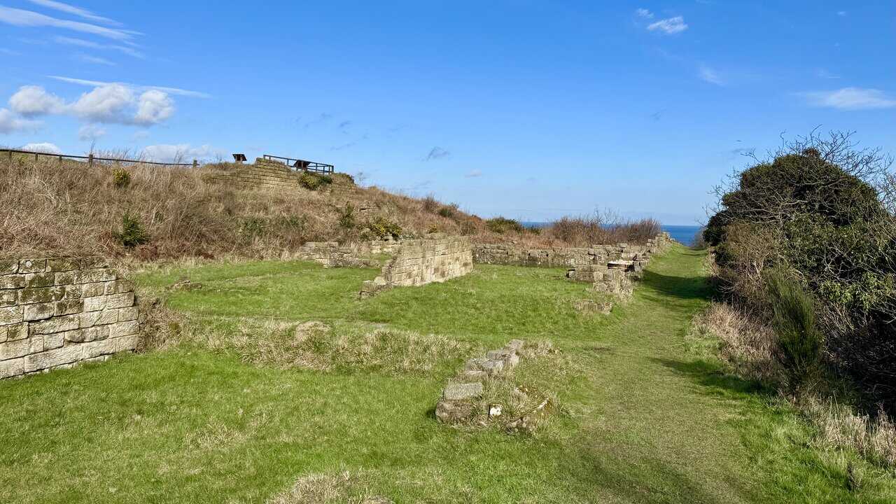 Remains of Peak Alum Works, showing the large scale of the old alum industry on the clifftop above the sea. A fascinating section of the Ravenscar walk.