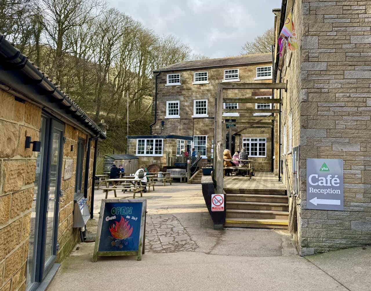 Quarterdeck café and youth hostel buildings at Boggle Hole, a popular stop for walkers near the beach and clifftop path.