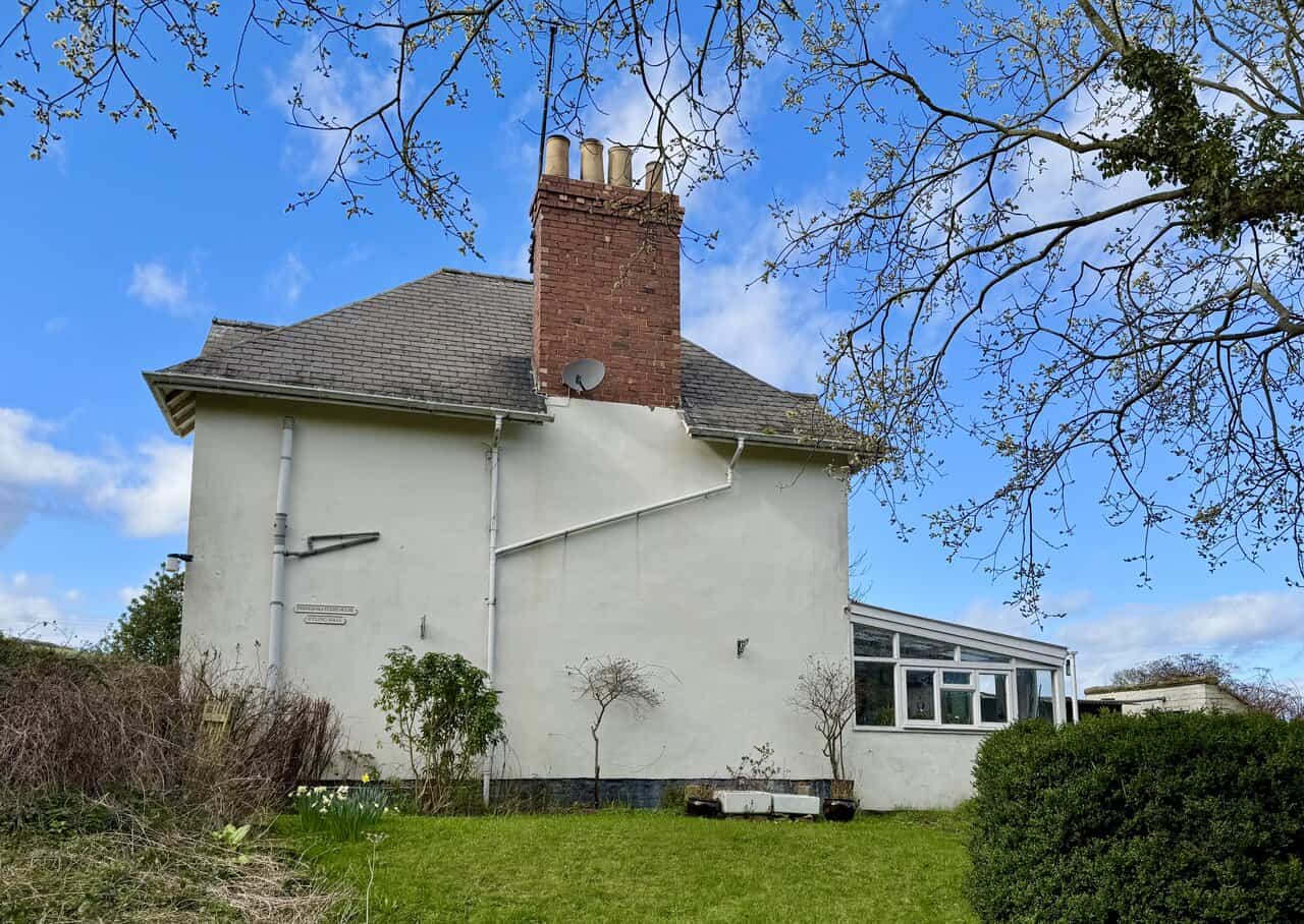 Stationmaster’s House at Fyling Hall beside the Cinder Track, a small white former railway building now used as a private house.