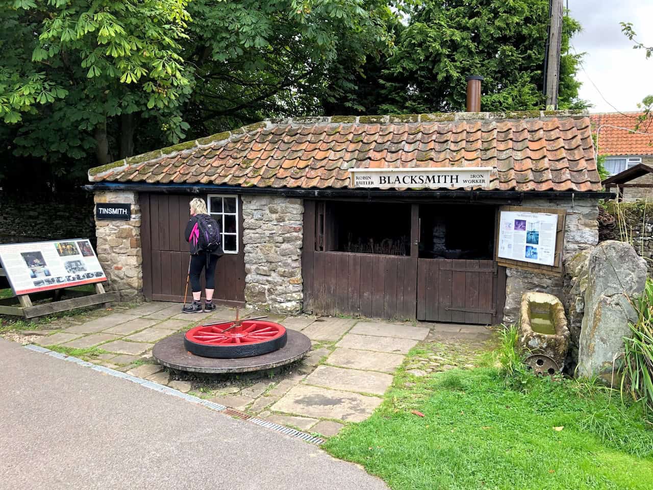 The Blacksmith's Forge, where volunteers continue to demonstrate the ancient craft of working metal, producing and repairing tools and horseshoes just as the village blacksmith once did.