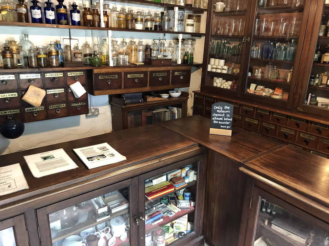 A closer look inside the Vintage Chemist at Ryedale Folk Museum, featuring the Cachet Machine, a specialist device used for the manual production of early medicinal doses, illustrating how pharmacy developed into a professional trade.