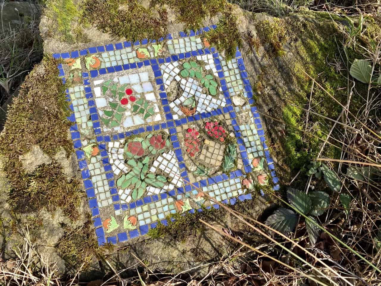 The Leaves mosaic sits beside the quiet lanes and fields of Dallowgill.