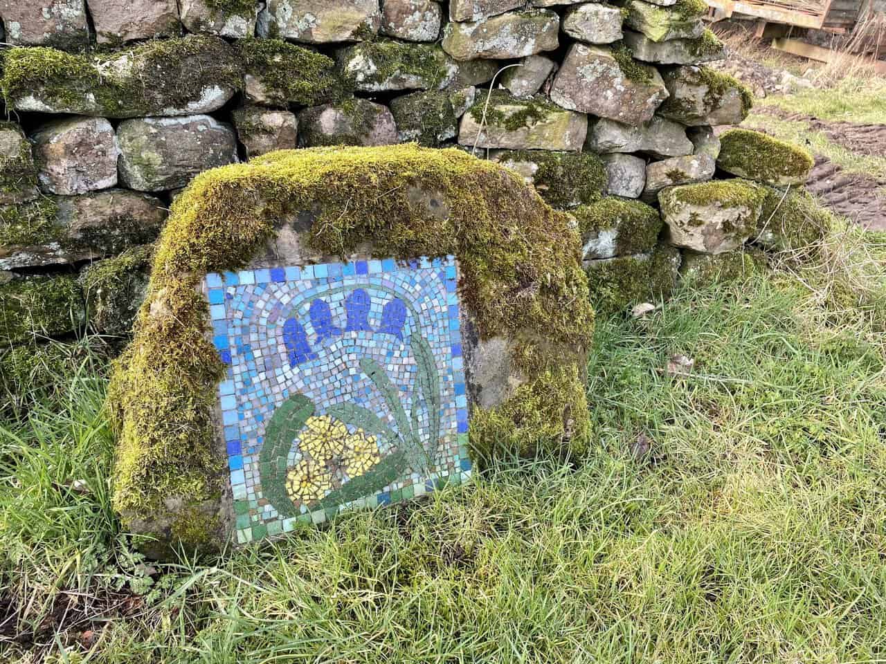 The Bluebells mosaic is found near Castiles Farm on Dallow Lane.