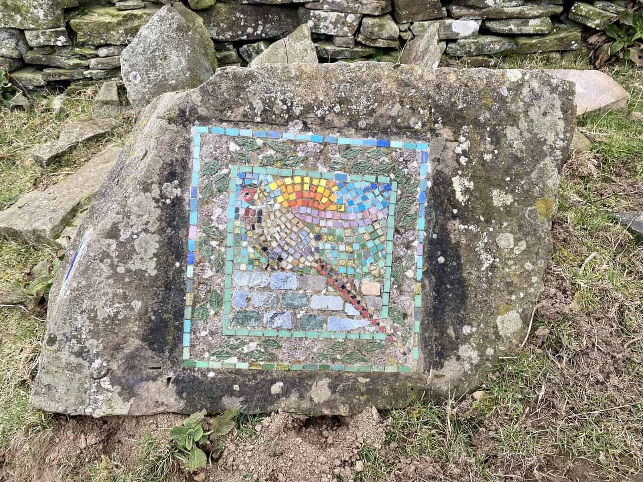 The Pheasant mosaic is found near Potter Lane Farm on the Crackpots Mosaic Walk.