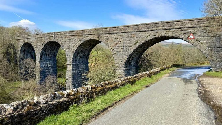 Appersett Viaduct rising above the surrounding fields, a notable landmark on the Hawes Mosaic Trail.