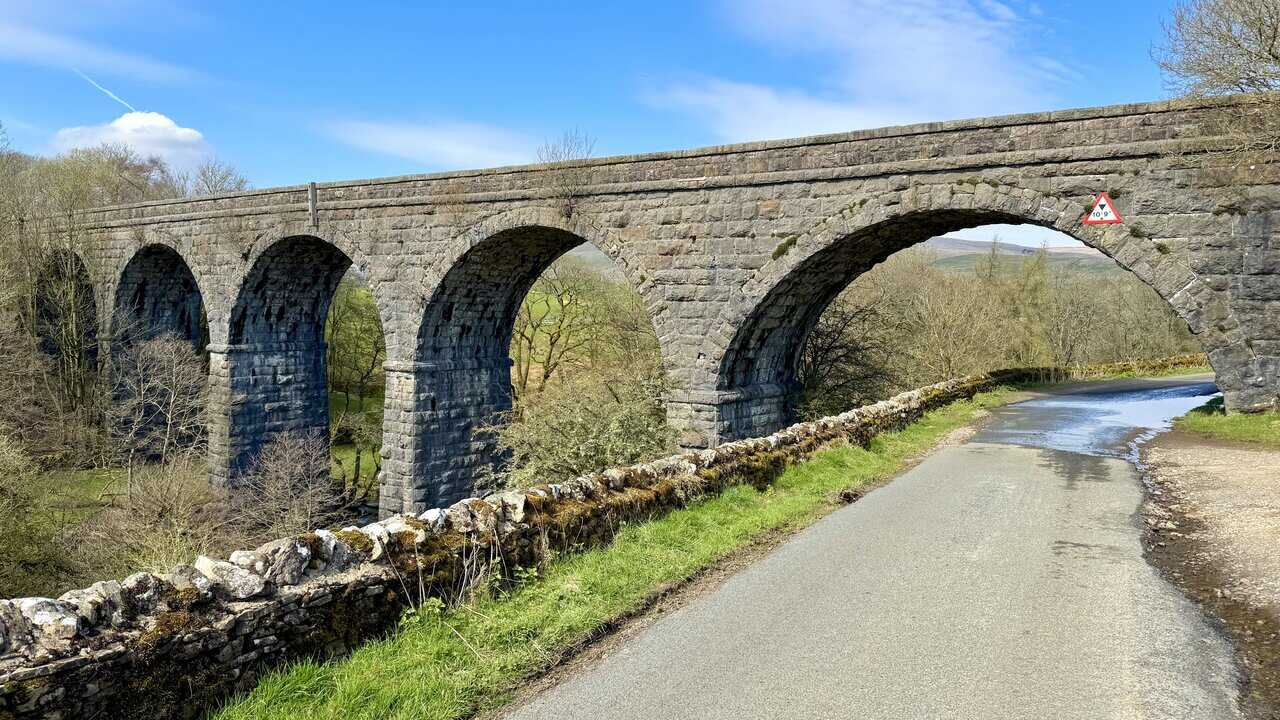 Appersett Viaduct rising above the surrounding fields, a notable landmark on the Hawes Mosaic Trail.