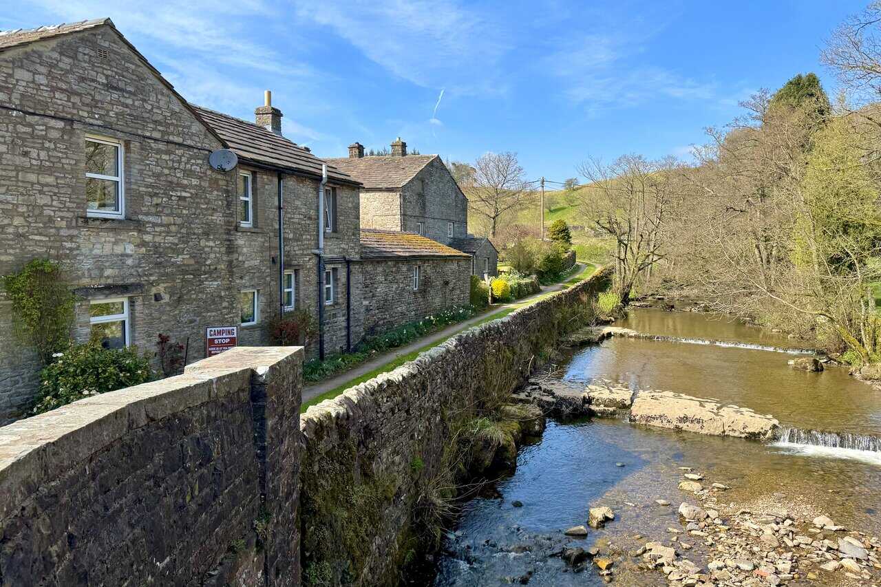 Hardraw Beck flowing through the village of Hardraw, adding to the charm of this stage of the walk.