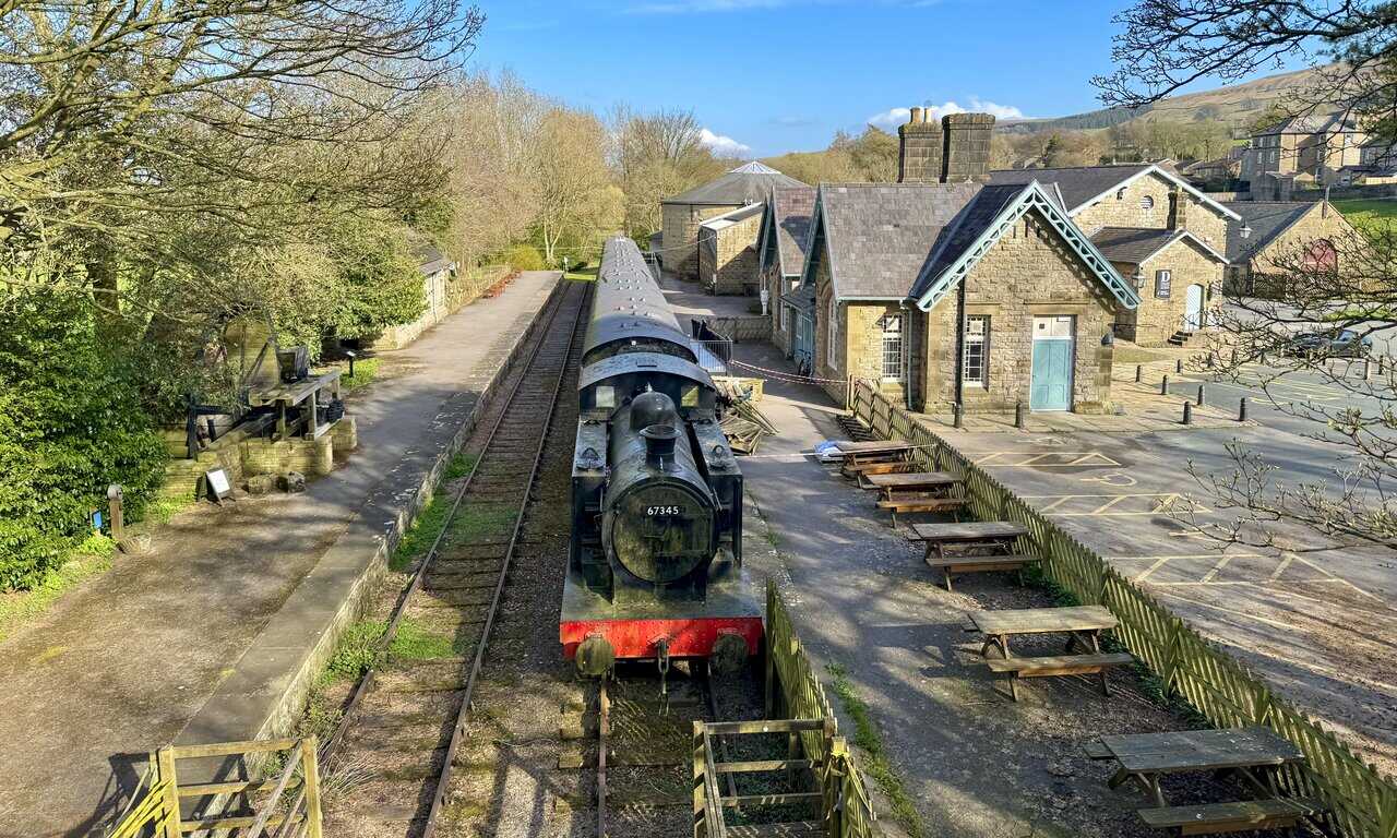 Steam train and railway track behind the Dales Countryside Museum in Hawes, linking local heritage with the Hawes Mosaic Trail.